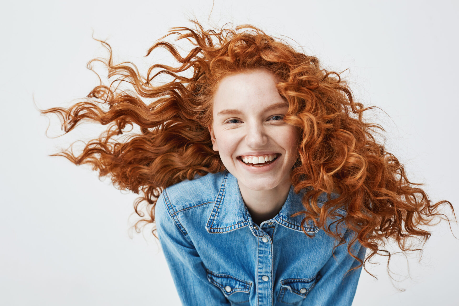 Portrait,Of,Beautiful,Cheerful,Redhead,Girl,With,Flying,Curly,Hair